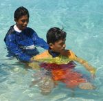 RESCUES, 4 DOUBLE SHOULDER TOW
Hold the casualty below the shoulders and swim with backstroke 3